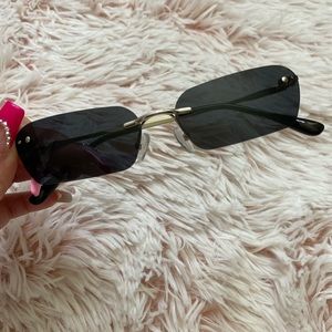 Black thin framed sunglasses